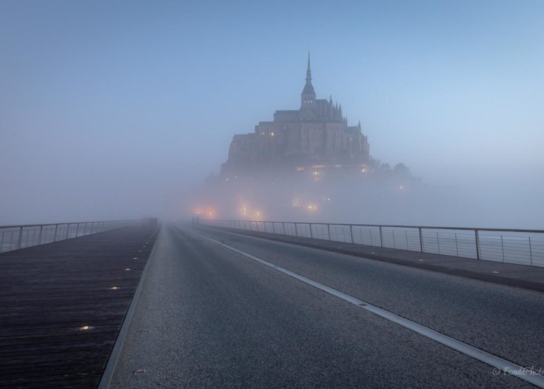 Mont-Saint-Michel from the bridge with fog