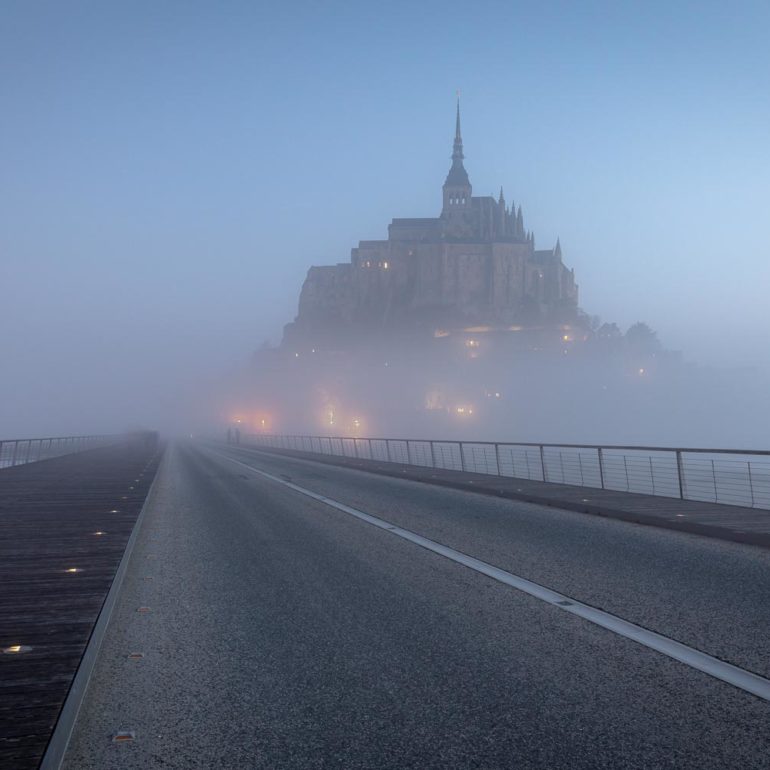 Mont-Saint-Michel from the bridge with fog