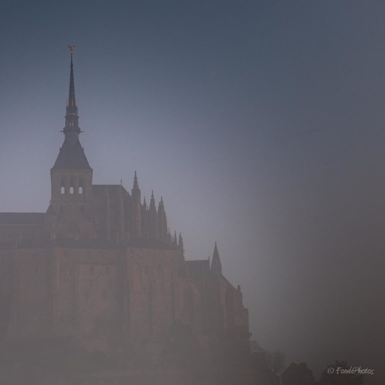 Mont-Saint-Michel from the bridge with fog