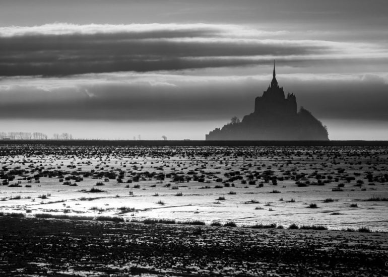 Mont-Saint-Michel from the bridge with fog